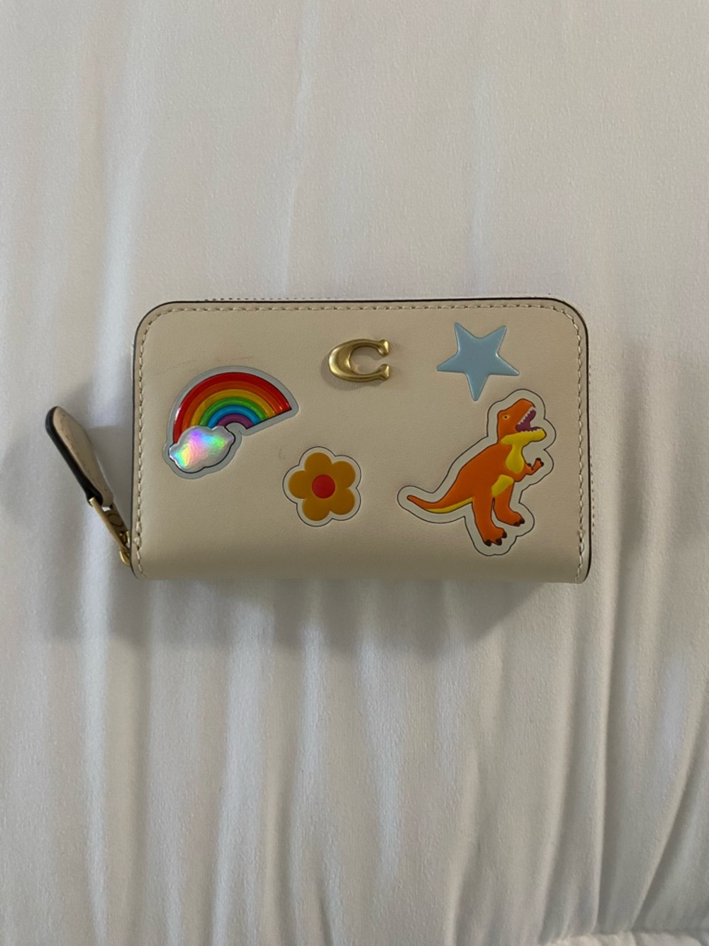 Coach Cream Zip Card Case with Rainbow & Dinosaur Stickers